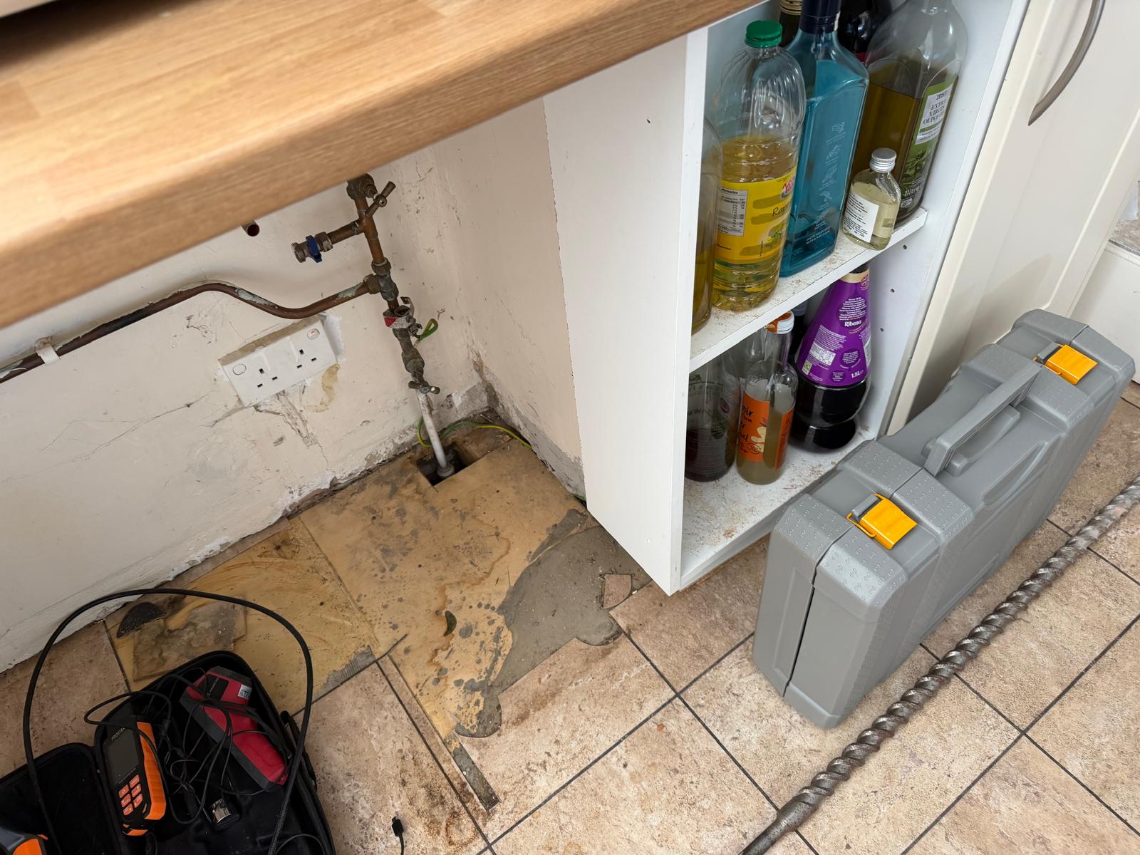 WhatsApp Image 2026-10-07 at 14.43.35 Pipework exposed beneath kitchen floor during investigation